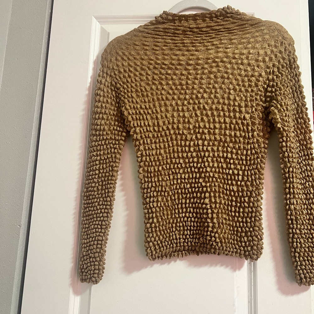 gold turtle neck sweatershirt